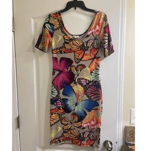 Stretchy, never worn, butterfly dress.